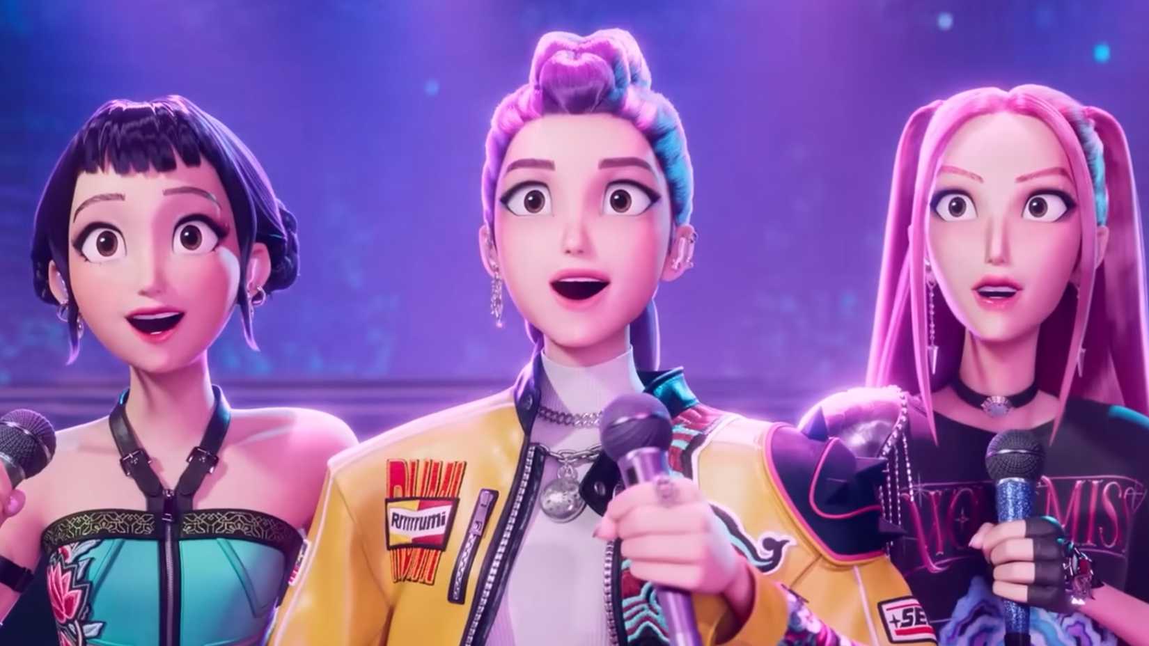 KPop Demon Hunters protagonists Zoey, Rumi, and Mira stand side-by-side, holding microphones and smiling.