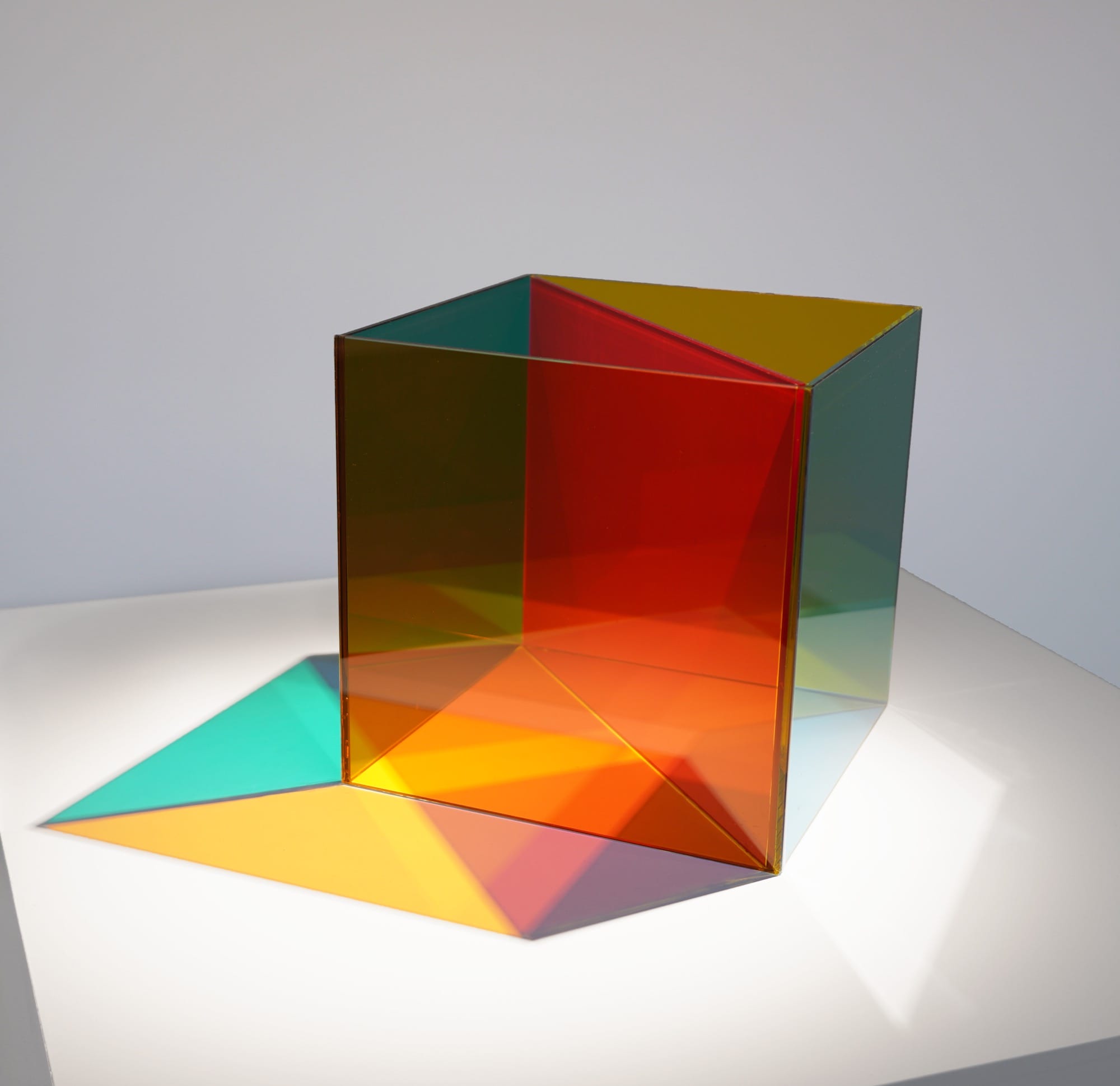 a colorful cubic sculpture by Luftwerk