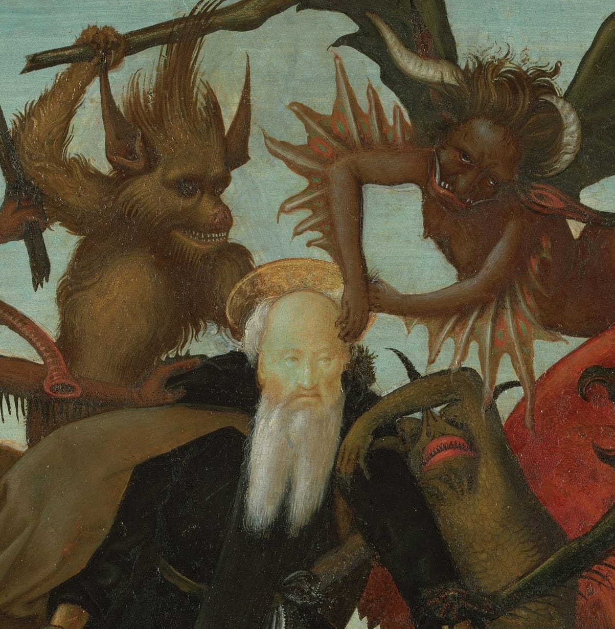 A detail of two demons in Michelangelo's painting of a tormented Saint Anthony
