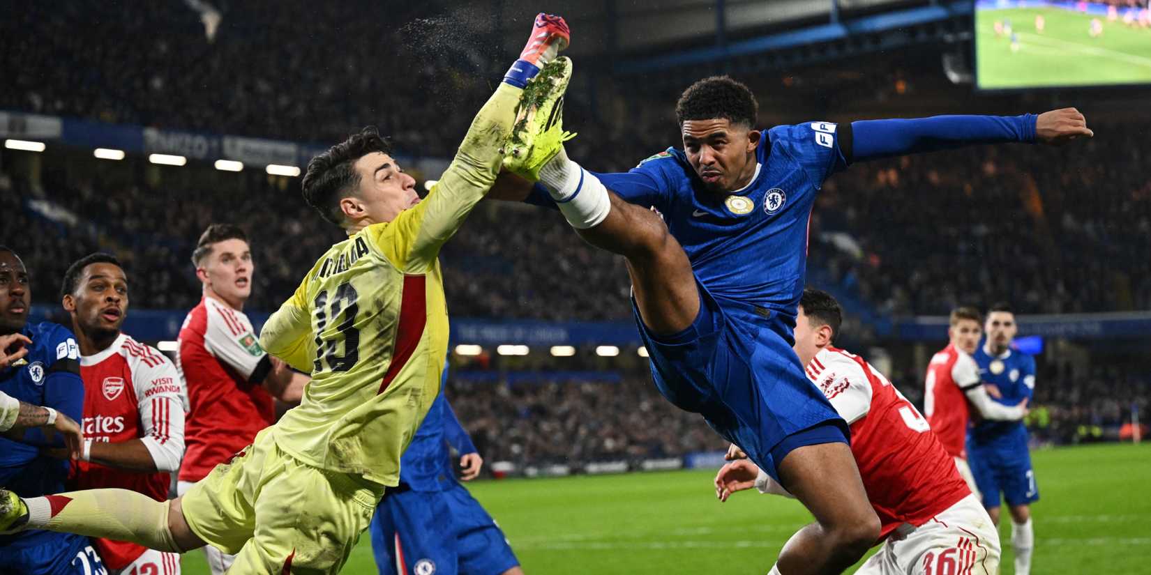 Arsenal's Kepa Arrizabalaga in action with Chelsea's Wesley Fofana