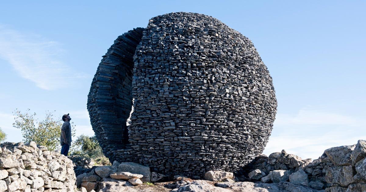 atelier yokyok sculpts sphere out of black schist in portugal