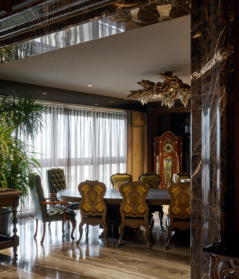 penthouse residence by metaphors blends neo-classical detail with brutalist geometry