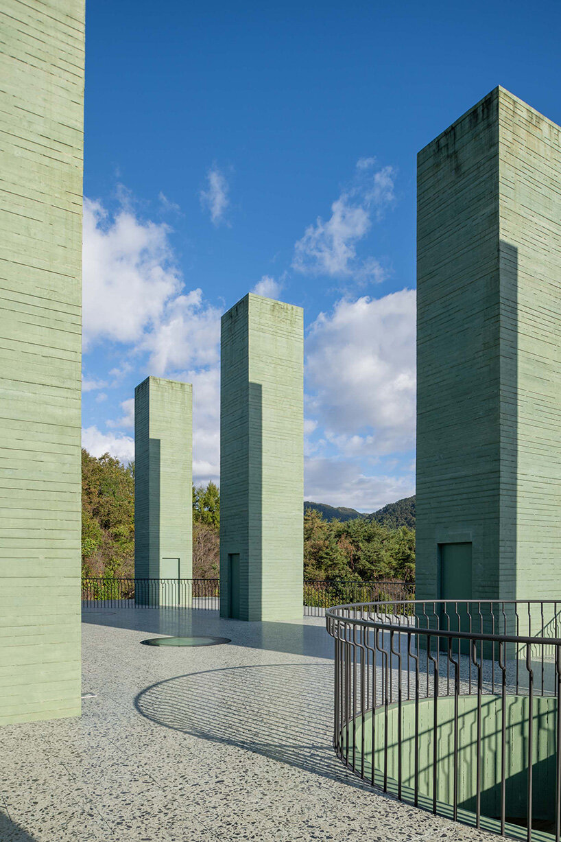 pezo von ellrichshausen raises field of inhabitable columns for restaurant in south korea