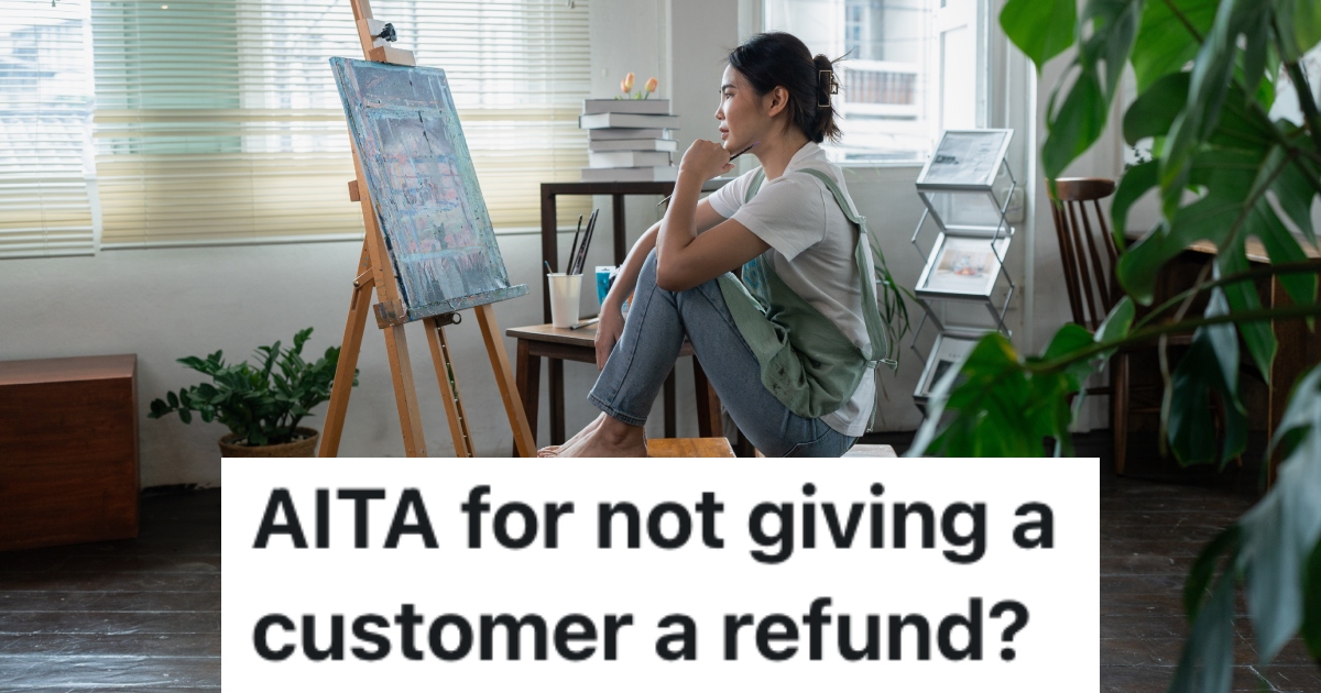 woman looking at a painting