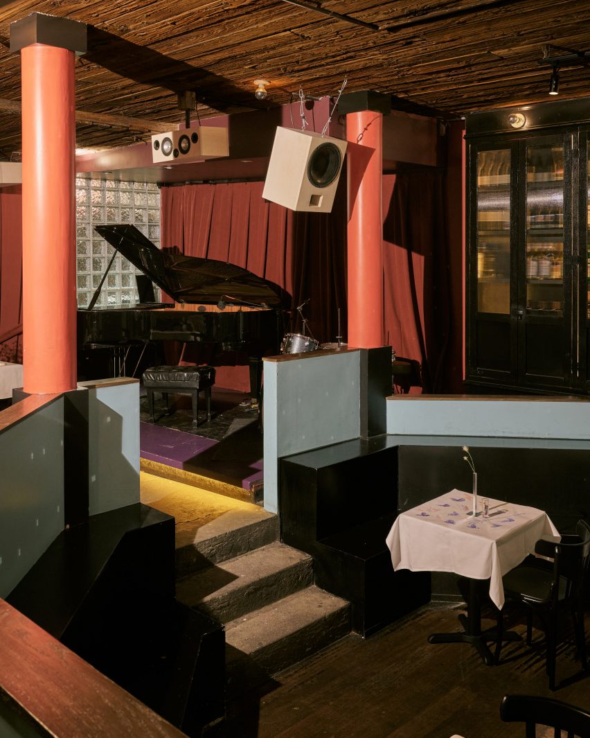 Sunken lounge with red columns