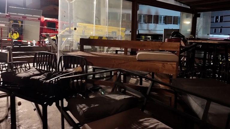 Emergency teams survey scene of fatal resort bar fire