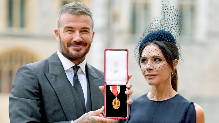 Sir David Beckham, with his wife Lady Victoria, after he was made a Knight Bachelor at an investiture ceremony. Pic: PA