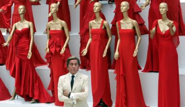 Valentino with some of his works in 2007 - sporting the designer's iconic 'Valentino red'. Pic: Reuters