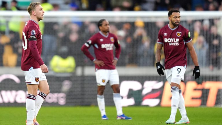 West Ham United players react after conceding a third goal against Wolves