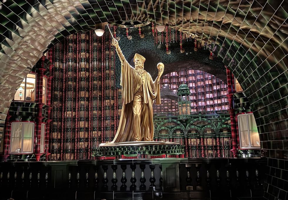 Statue in queueline Ministry offices at Harry Potter and the Battle at the Ministry Wizarding World of Harry Potter Ministry of Magic Universal Epic Universe