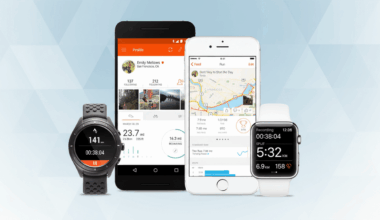 A smartwatch, a black smartphone, a white smartphone, and a white Apple Watch displaying fitness tracking apps and data.
