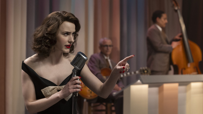 Rachel Brosnahan's Midge Maisel performing with a microphone on The Marvelous Mrs. Maisel
