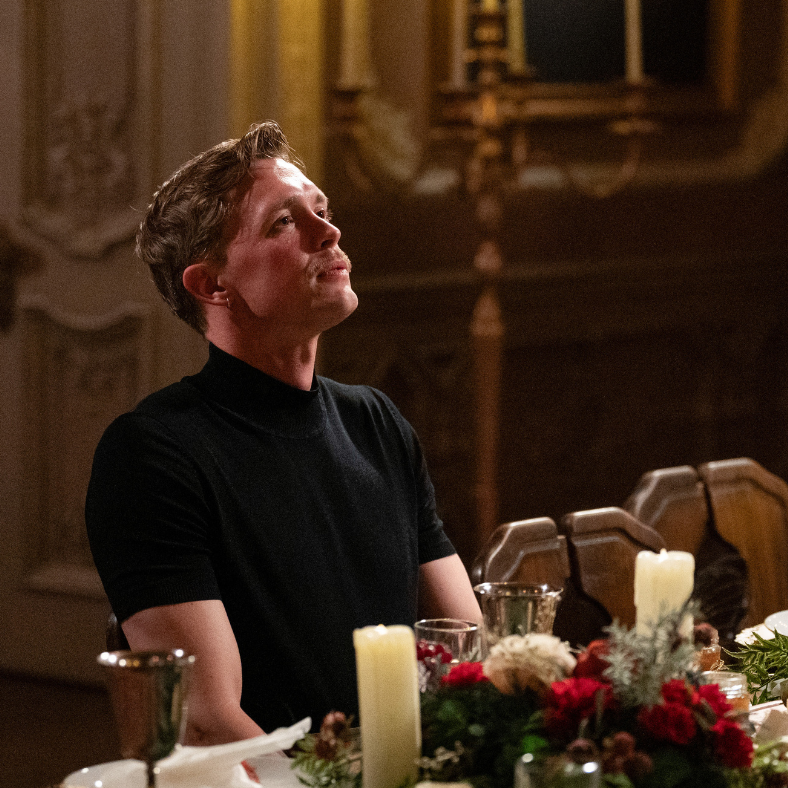 person seated at an elegantly set dining table