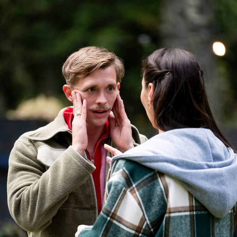 interaction between two people in an outdoor setting