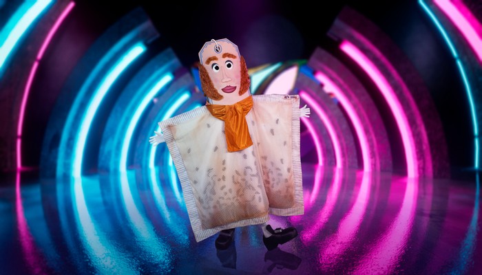 ©ITV Plc Someone dressed as a teabag with a face on.