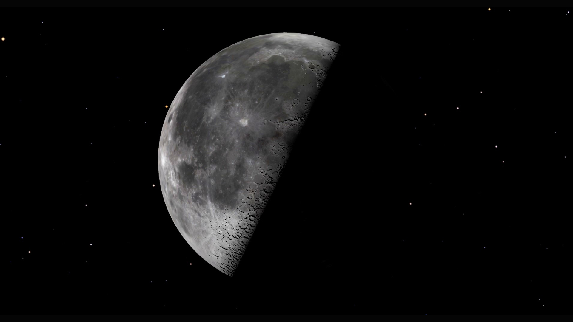 A close up of the moon in the darkness of space, with only its top left half illuminated, cut in half diagonally from bottom left to top right