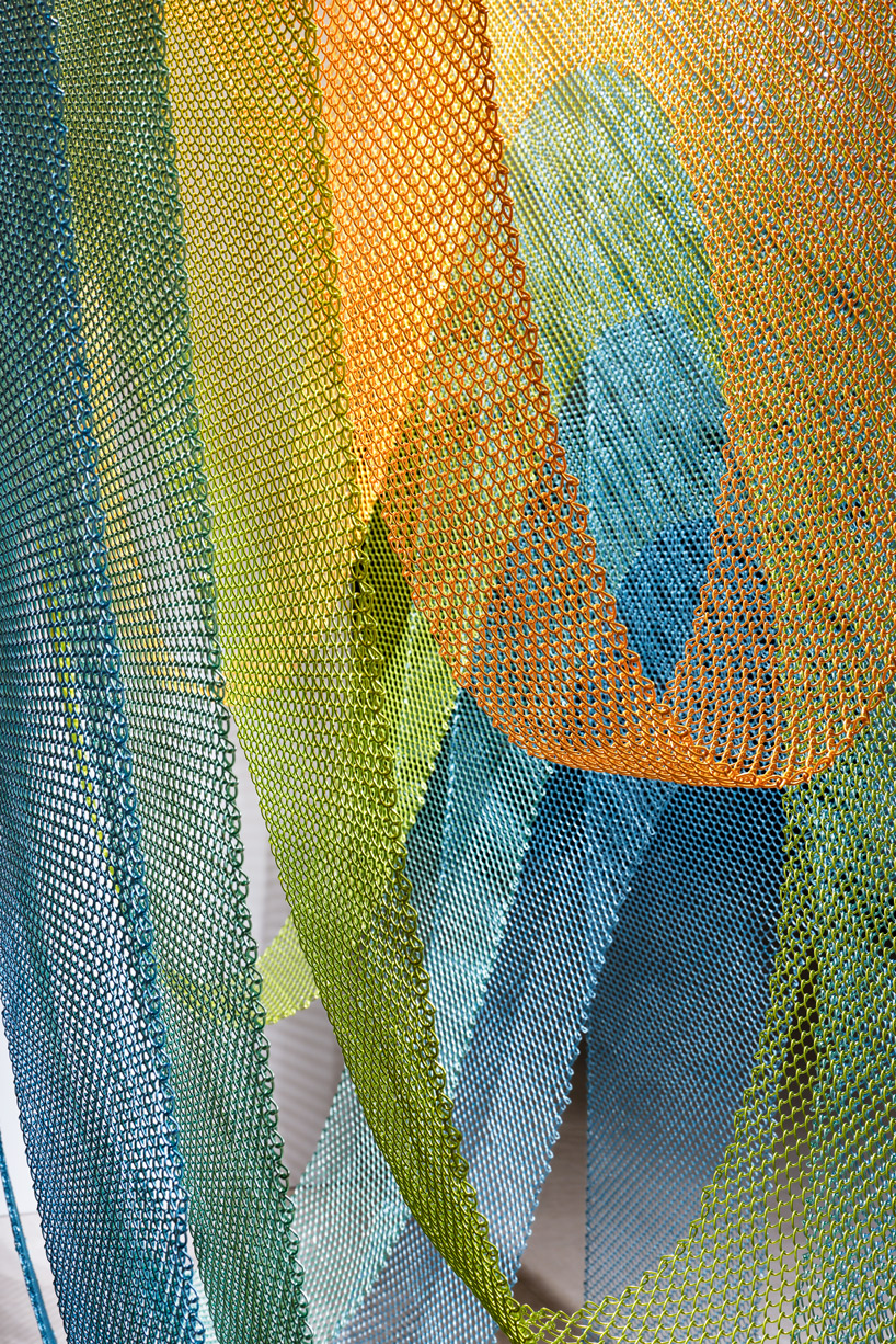 luminous layers of colored wire mesh weave tea ceremony house by moriyuki ochiai