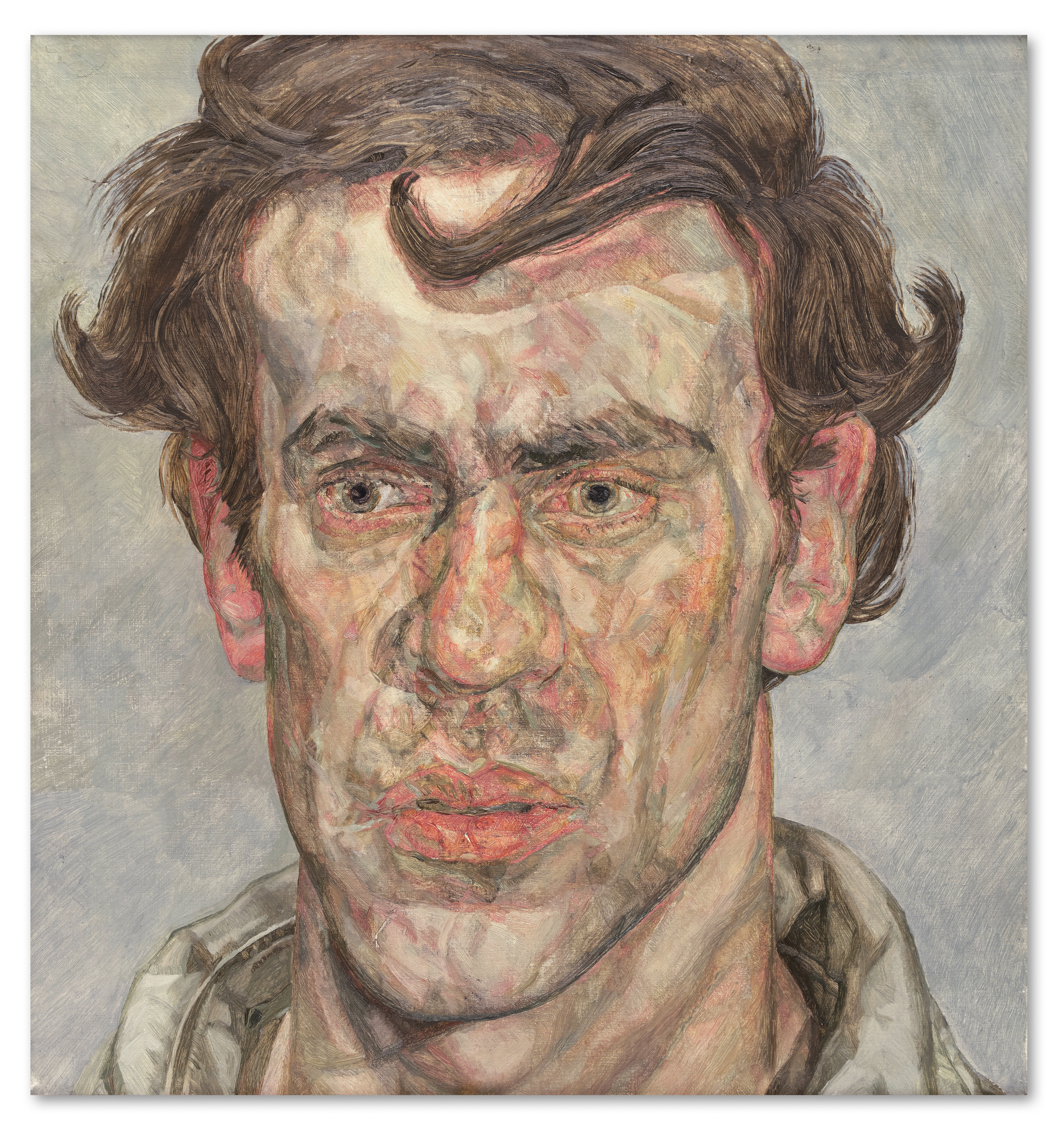 An oil painting by Lucian Freud titled "A Young Painter" depicts a man with dark, curly hair and an intense gaze.