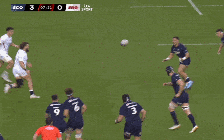 A rugby match in progress with Scotland scoring 3 points against England's 0.