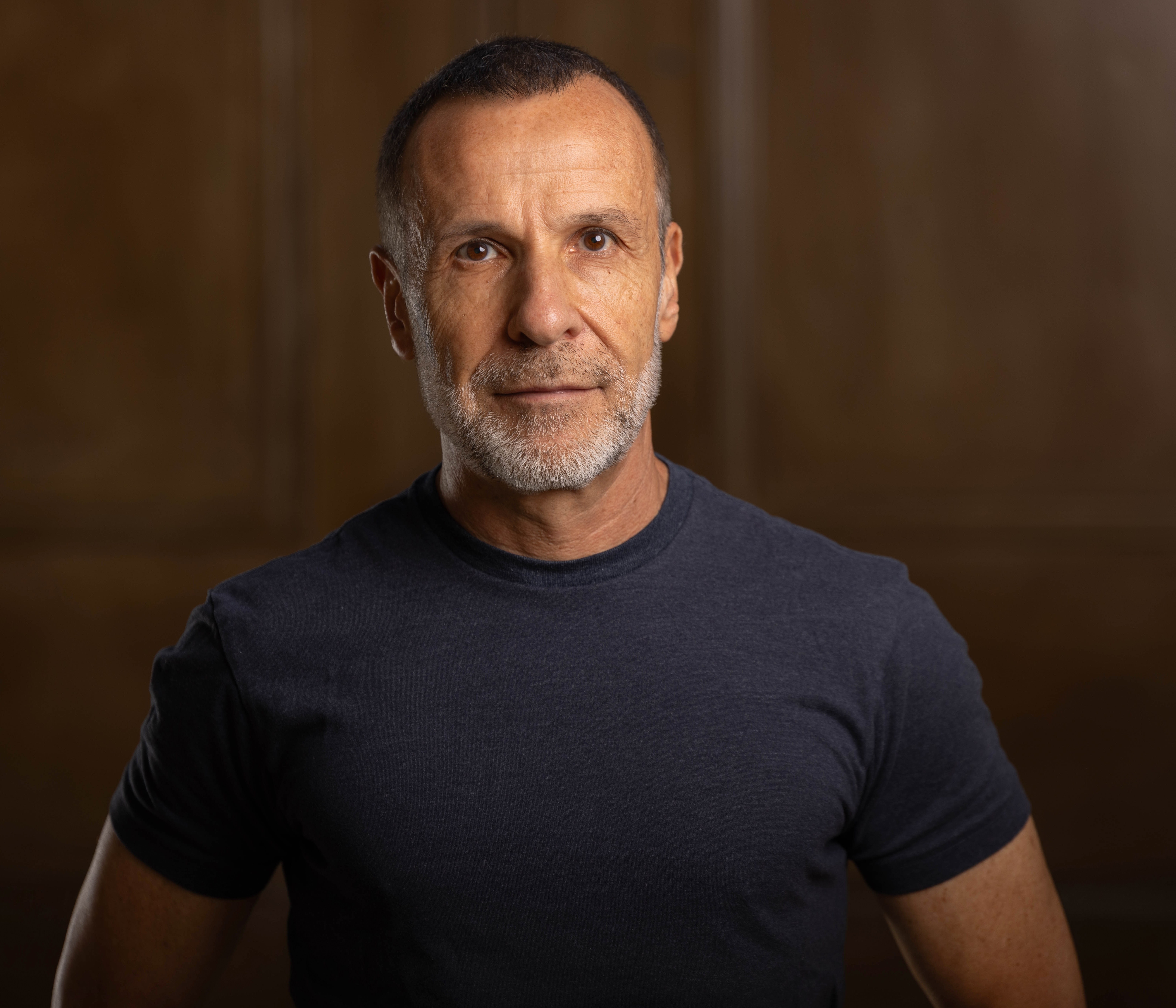 Portrait of Guy Winch, author of "Mind over Grind".