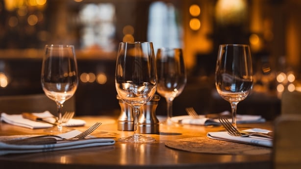 Image shows a table setting at a restaurant