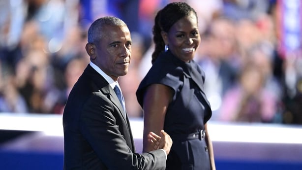 Former US President Barack Obama and his wife and former First Lady Michelle Obama on stage at the Democratic National Convention in Chicago on 20 August 2024