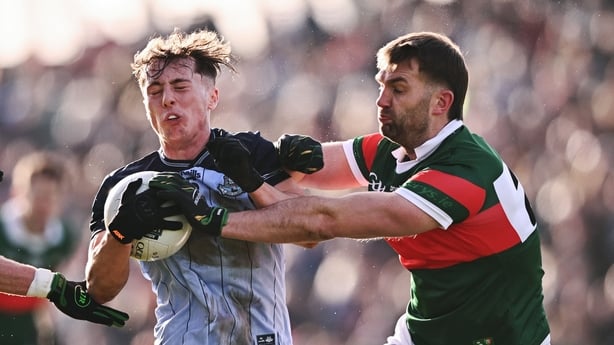 1 February 2026; Conor Tyrrell of Dublin is tackled by Aidan O'Shea of Mayo during the Allianz Football League Division 1 match between Mayo and Dublin at the Hastings Insurance MacHale Park in Castlebar, Mayo. Photo by Ben McShane/Sportsfile
