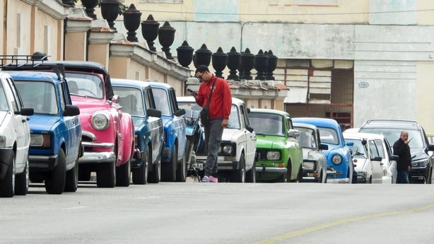 Vehicles wait in line to refuel at a gas station in Havana, Cuba