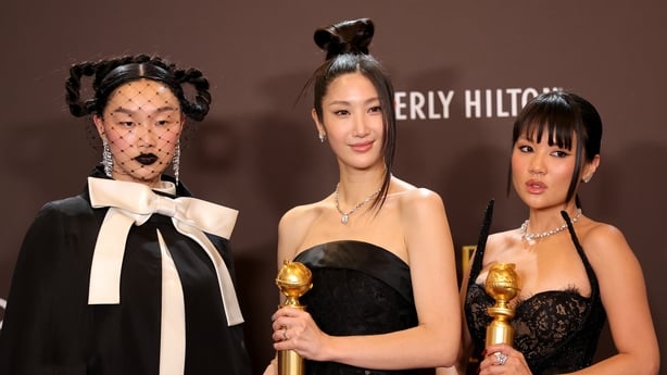 BEVERLY HILLS, CALIFORNIA - JANUARY 11: (FOR EDITORIAL USE ONLY) (L-R) Audrey Nuna, EJAE and Rei Ami, winners of the Best Original Song - Motion Picture for 
