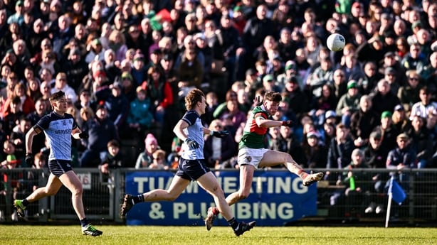 1 February 2026; Bob Tuohy of Mayo in action against Nathan Doran, centre and Killian McGinnis of Dublin during the Allianz Football League Division 1 match between Mayo and Dublin at the Hastings Insurance MacHale Park in Castlebar, Mayo. Photo by Ben McShane/Sportsfile