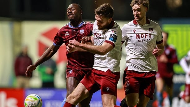 6 February 2026; Francely Lomboto of Galway United in action against Conor Keeley of Drogheda United during the SSE Airtricity Men's Premier Division match between Galway United and Drogheda United at Eamonn Deacy Park in Galway. Photo by Thomas Flinkow/Sportsfile