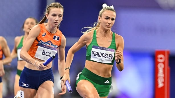 10 August 2024; Sharlene Mawdsley of Team Ireland, right, and Femke Bol of Team Netherlands during the women's 4x400 relay final at the Stade de France during the 2024 Paris Summer Olympic Games in Paris, France. Photo by Sam Barnes/Sportsfile