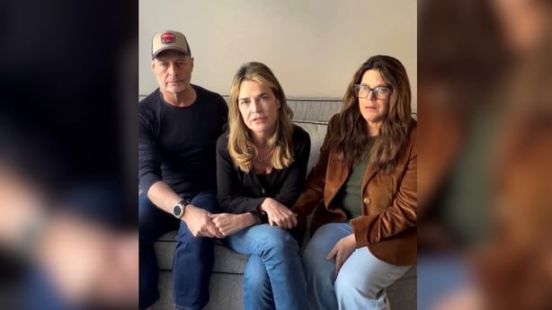 US journalist and television host Savannah Guthrie, accompanied by her siblings Annie and Camron, speaks in a video message
