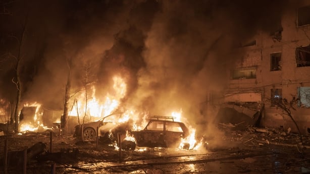 Vehicles burn in the aftermath of Russian destruction caused by two KAB bombs in the city of Kramatorsk