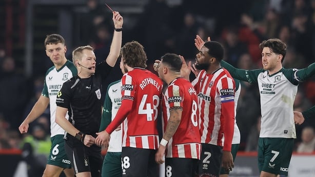 SHEFFIELD, ENGLAND - FEBRUARY 09: Joe Rothwell of Sheffield United is shown a red card by referee Gavin Ward during the Sky Bet Championship match between Sheffield United and Middlesbrough at Bramall Lane on February 09, 2026 in Sheffield, England. (Photo by James Gill - Danehouse/Getty Images)