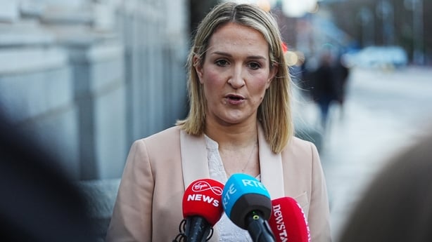 Minister for Foreign Affairs and Trade Helen McEntee speaking to the media as she arrives at Government Buildings