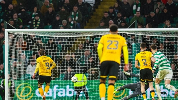 Livingston's Robbie Muirhead (l) scores against Celtic - February 2026