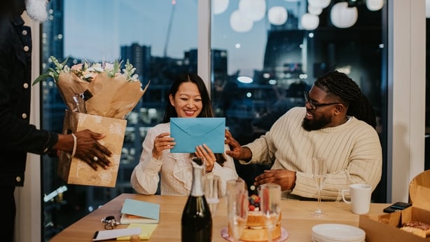An after-work office party for a female employee. 