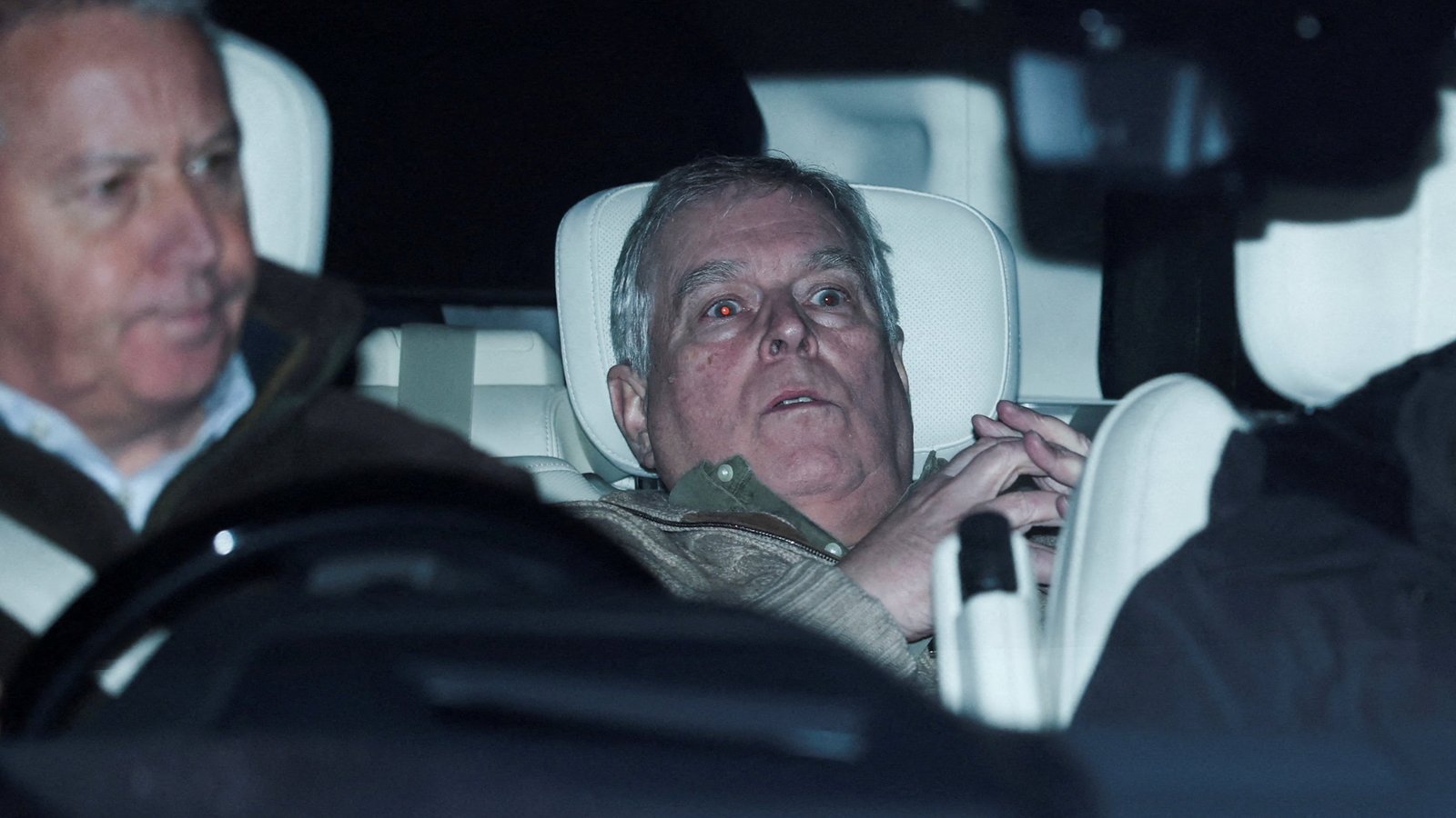 Andrew's arrest and the story behind that photo