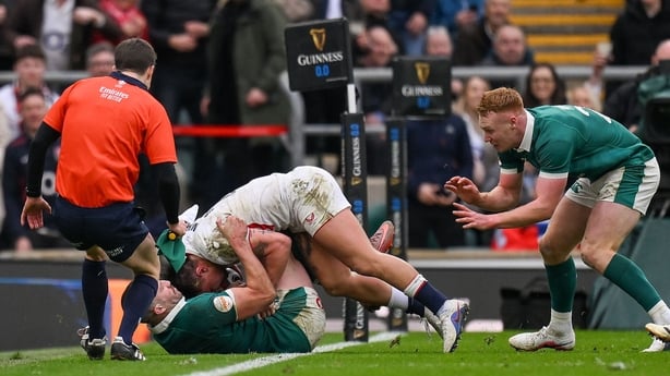 21 February 2026; Stuart McCloskey of Ireland drags England's Marcus Smith into touch during the Guinness 6 Nations Rugby Championship match between England and Ireland at the Allianz Stadium in Twickenham, England. Photo by Brendan Moran/Sportsfile