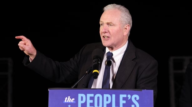 Senator Chris Van Hollen speaks on stage 