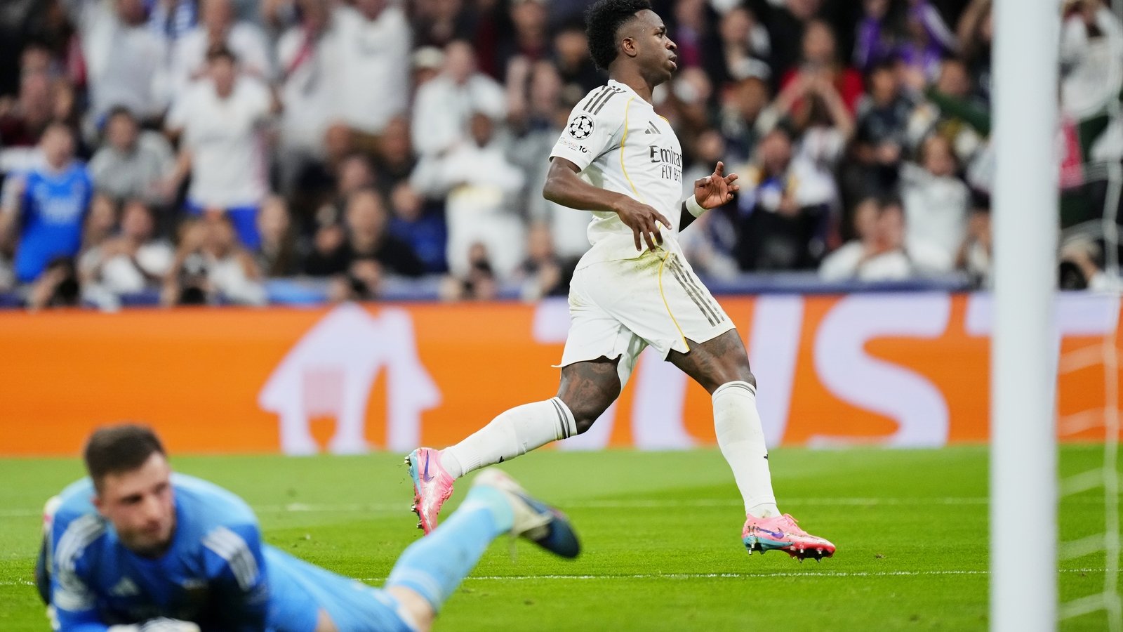 Vinicius grabs winner as Real progress past Benfica