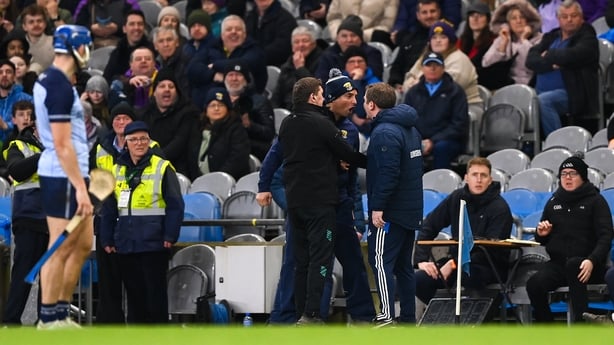 21 February 2026; Wexford manager Keith Rossiter, left, and Dublin manager Niall Ó Ceallacháin exchange views during the Allianz Hurling League Division 1B match between Dublin and Wexford at Croke Park in Dublin. Photo by Stephen McCarthy/Sportsfile