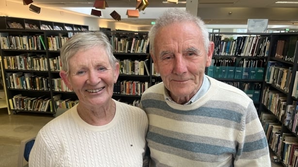 Bob and Maureen McNamara stand in Tallaght library
