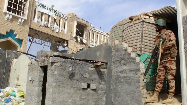 A Pakistani soldier stands guard at the Pakistan-Afghanistan border in Chaman on February 27, 2026