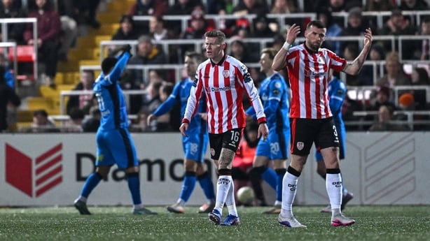 Derry City's James McClean, left, and Patrick McClean react after Waterford's goal at the Brandywell