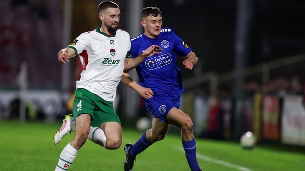 Cork City's Fiacre Kelleher and Daniel Ring of Bray Wanderers battle for possession