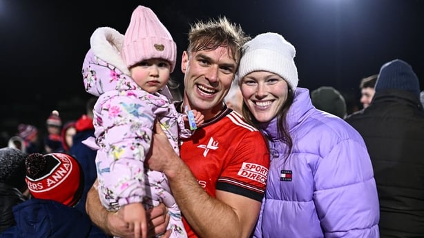 Conor Grimes of Louth celebrates with his daughter Izzy, and his wife Jayne after his side's victory in the Allianz Football League Division 2 match between Cavan and Louth at Kingspan Breffni in Cavan. 