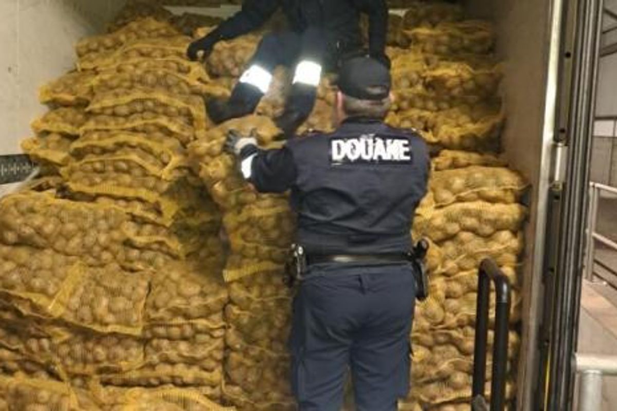 French Customs officials with the lorry carrying the illegal cigarettes that were destined for Ireland.