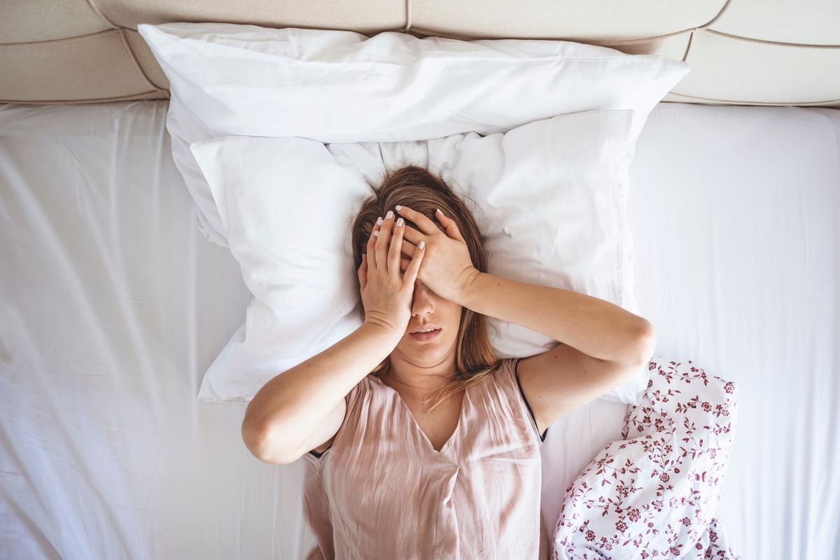 woman having migraine